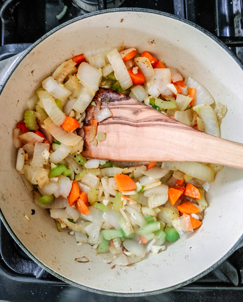 Vegetables cooking in le creuset pot 