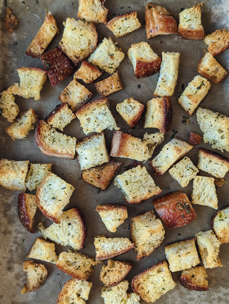homemade croutons on a sheet tray 
