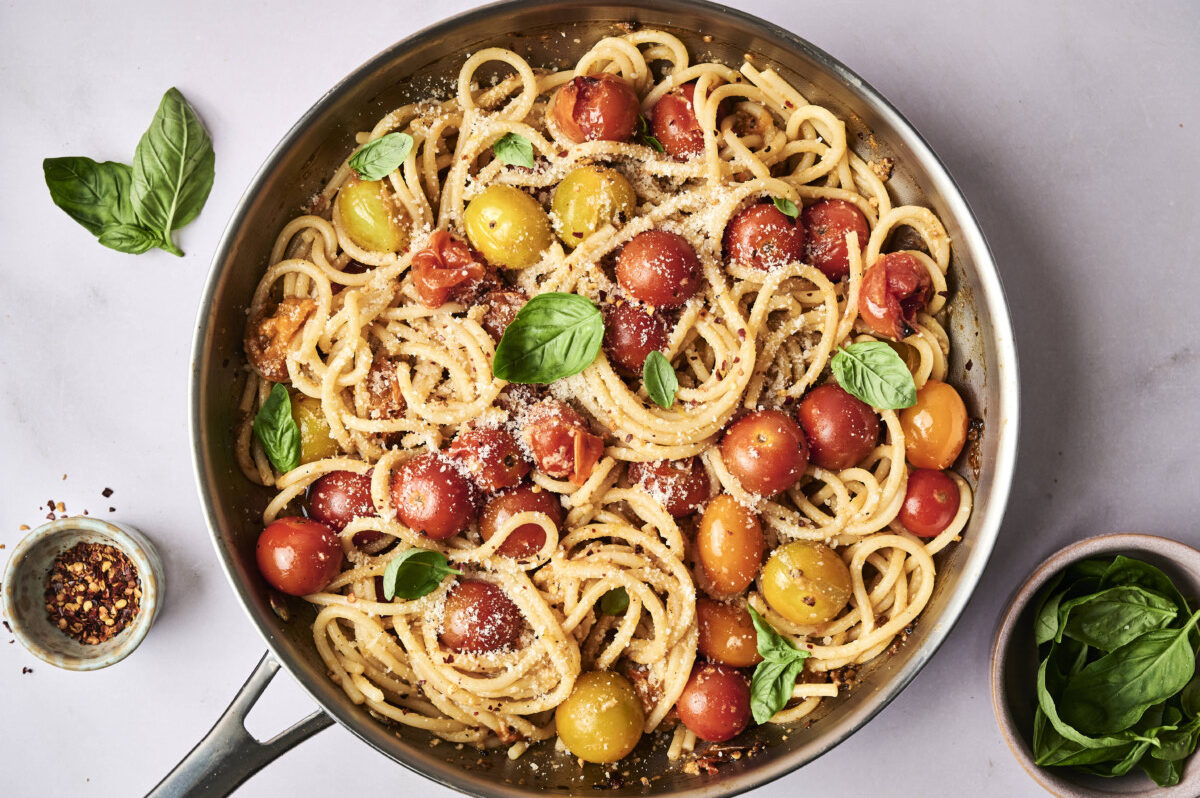cherry tomato pasta cooked in a pan