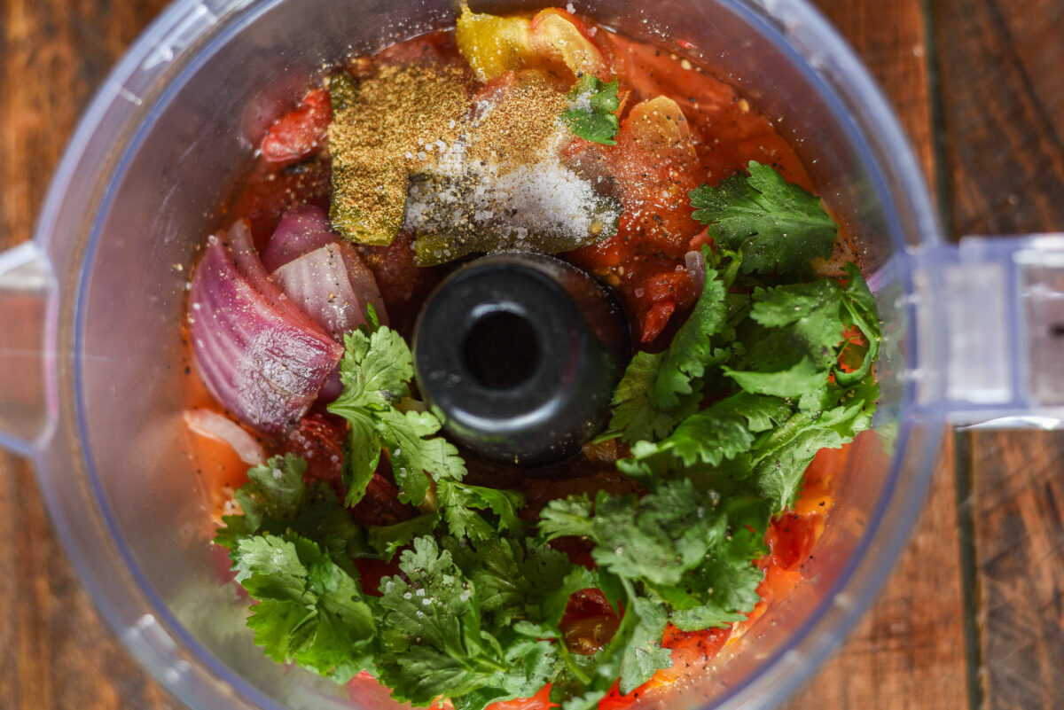 Roasted veggies for tomato salsa in food processor 