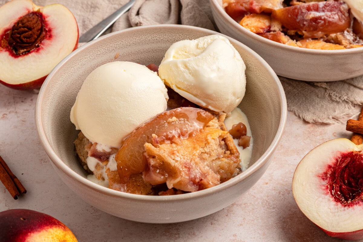 cobbler in serving bowl with ice cream 